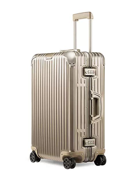 saks rimowa luggage.